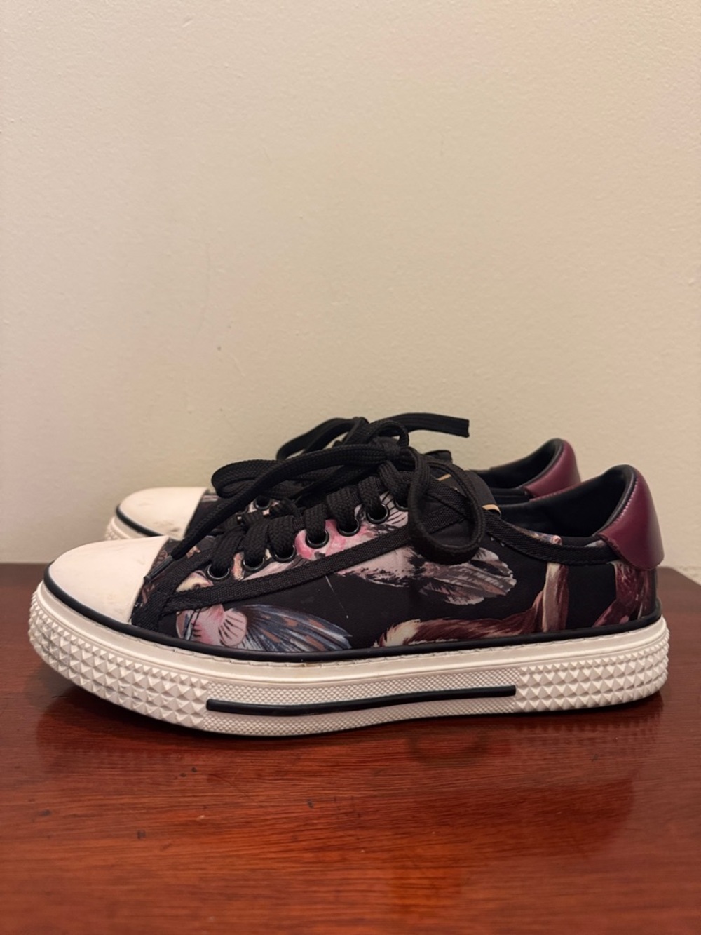 Valentino Garavani Black Floral Print Low-Top Sneakers with Cream Toe Caps